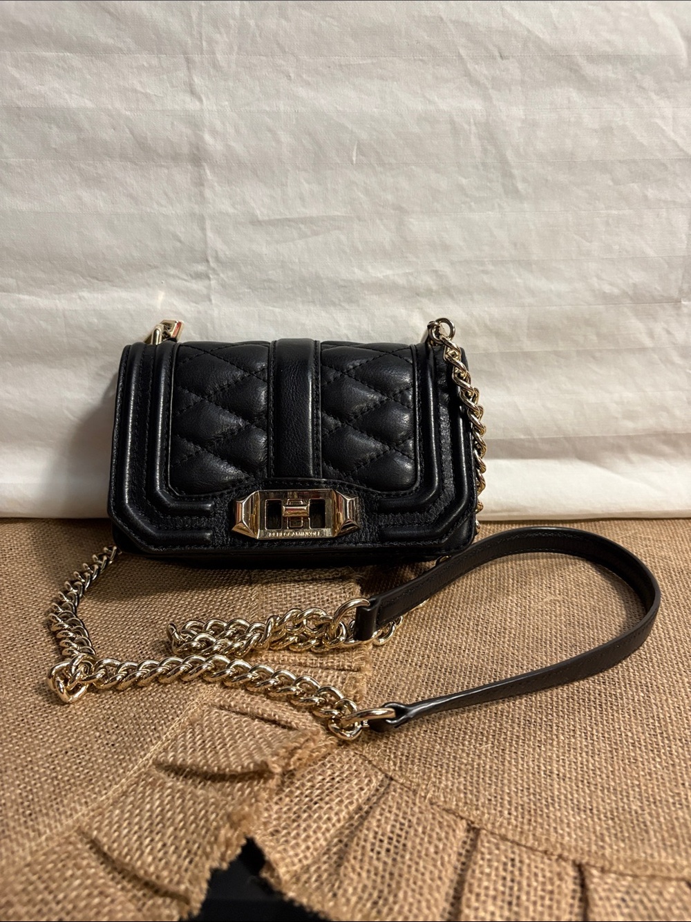 Black Quilted Leather Crossbody Bag with Gold Chain Detail